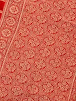 Attractive Red Color Georgette Designer Saree With Flower Motifs And Fancy Tassels