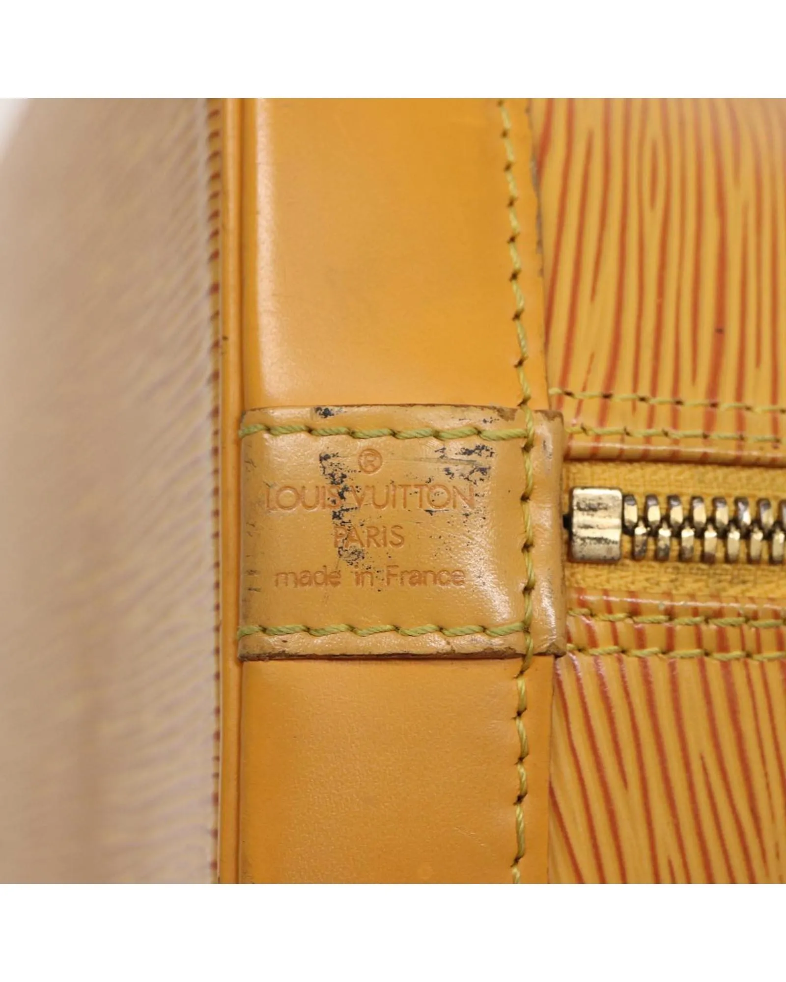 Epi Leather Alma Hand Bag with Classic Design