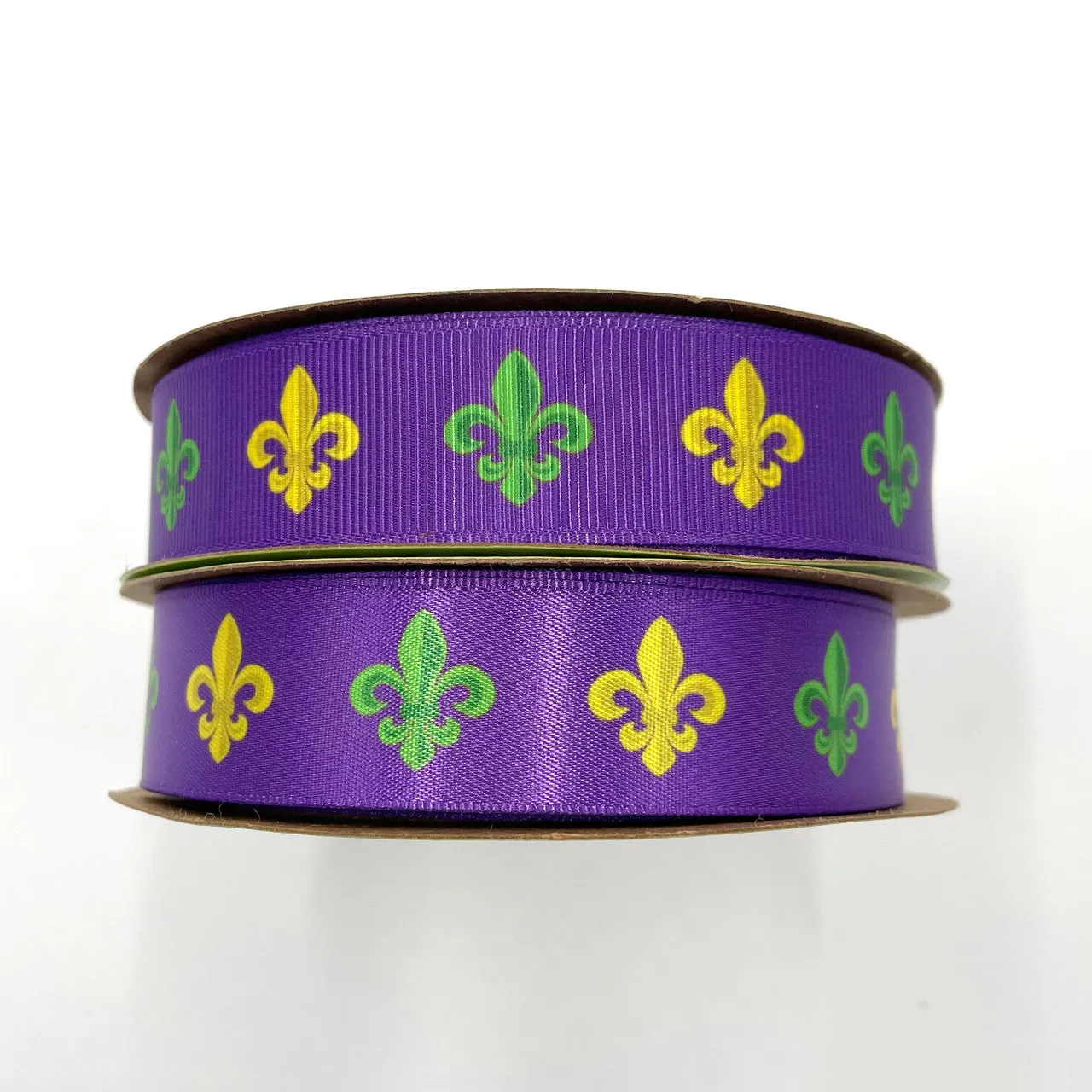 Mardi Gras ribbon with French fleur de lIs in green and yellow on a purple background printed on 7/8" white single face satin
