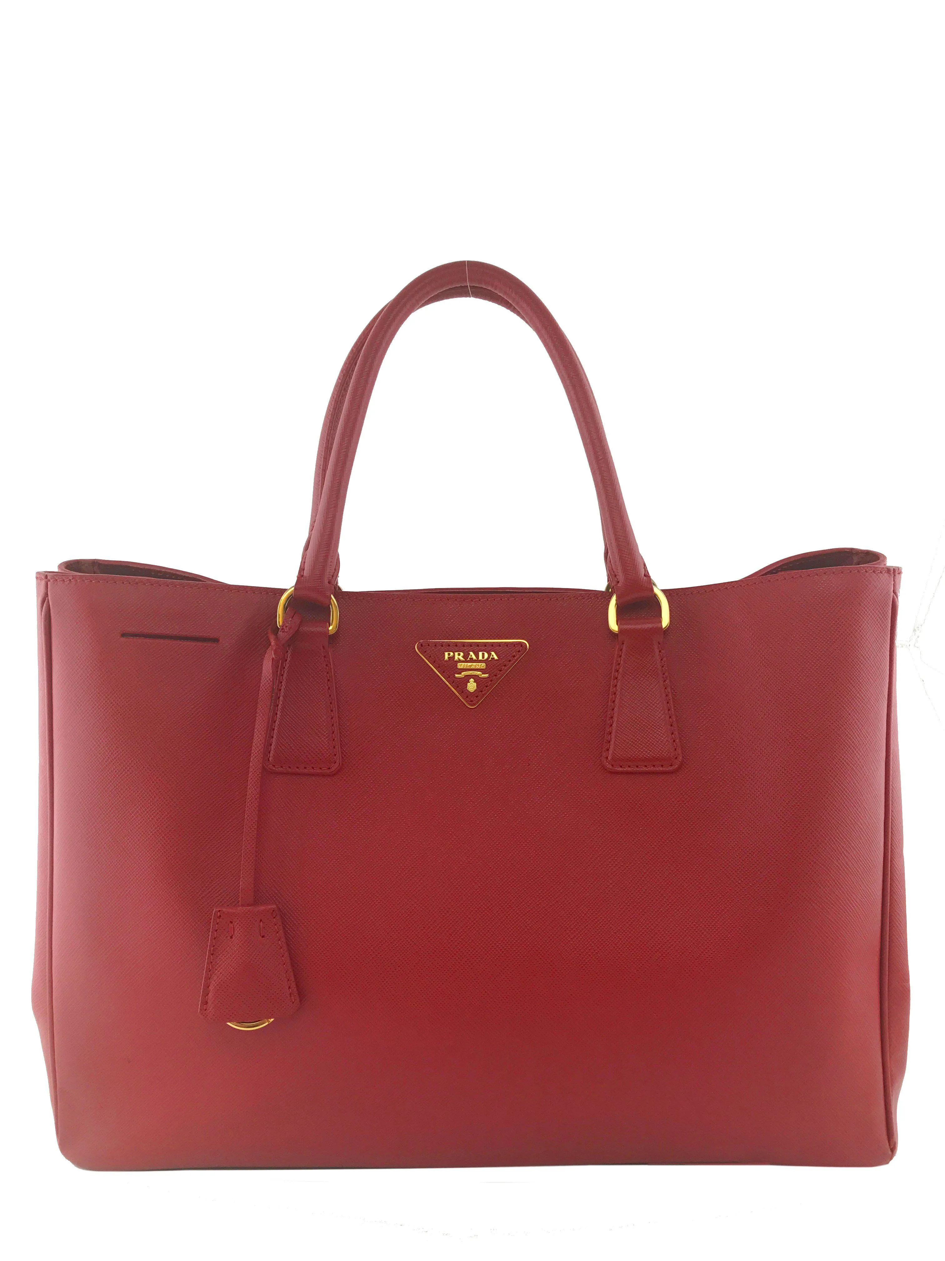 Prada Saffiano Lux Large Tote Bag optimized for e-commerce with modifiers would be:

Prada Large Saffiano Lux Leather Tote Bag - Elegant Designer Handbag

This title includes materials and style, enhancing searchability and appeal.