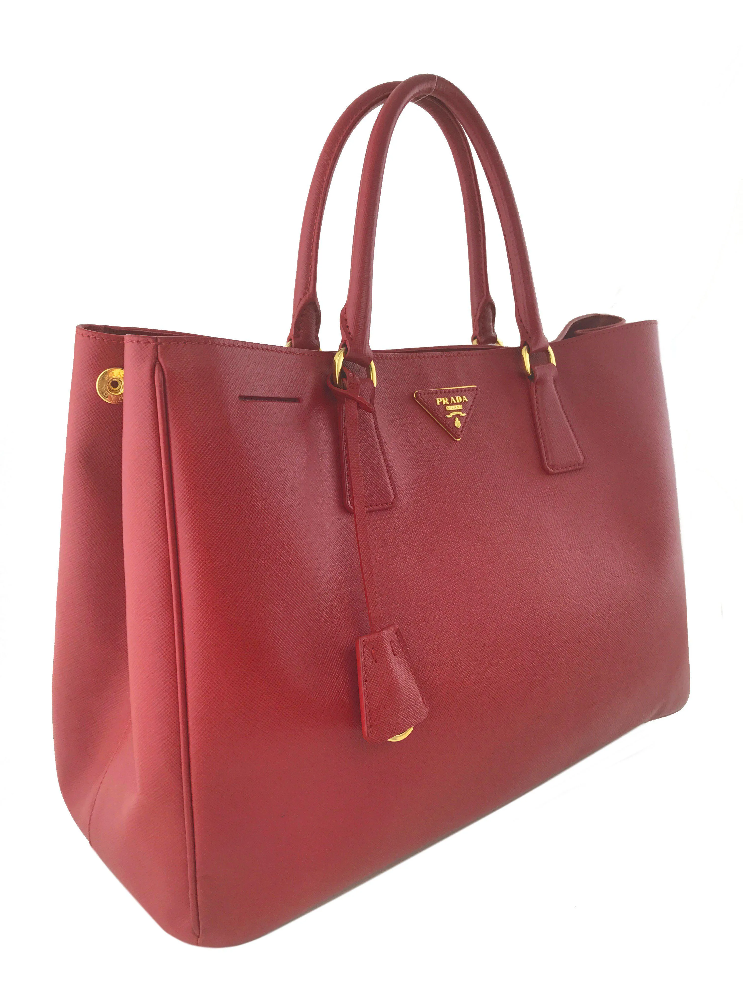 Prada Saffiano Lux Large Tote Bag optimized for e-commerce with modifiers would be:

Prada Large Saffiano Lux Leather Tote Bag - Elegant Designer Handbag

This title includes materials and style, enhancing searchability and appeal.
