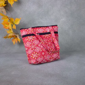 Small Handbag Red Colour with Green Diamond Design.