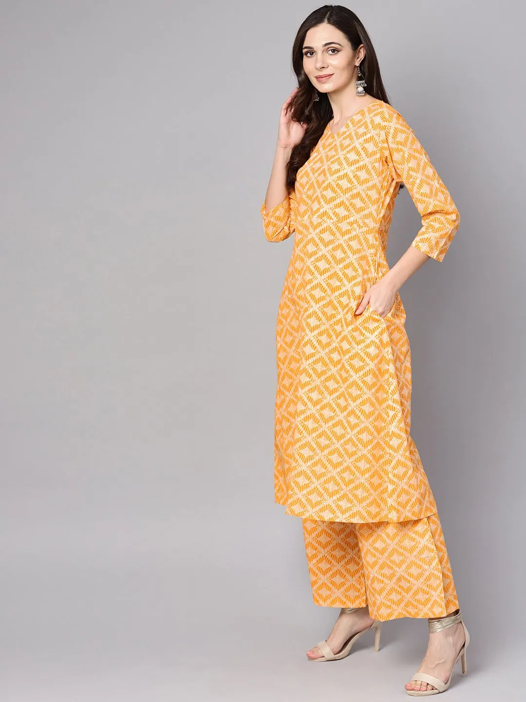 Yellow Geometric Printed Kurta Set With Flared Palazzo