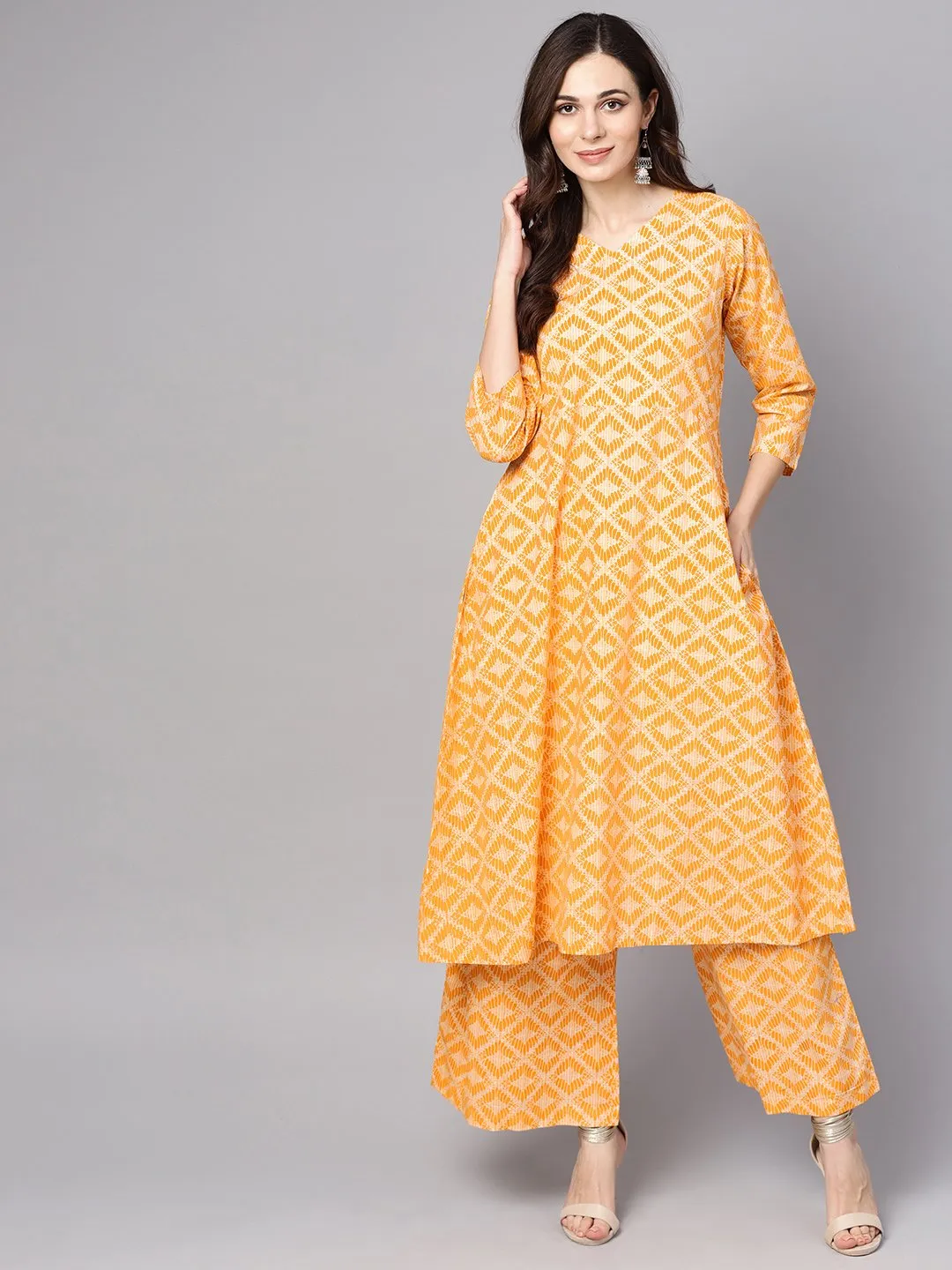 Yellow Geometric Printed Kurta Set With Flared Palazzo